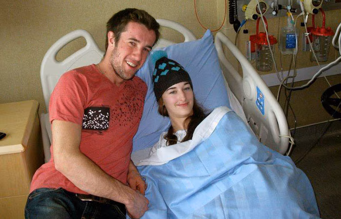 Suzanne Lambregts in the hospital with her boyfriend.