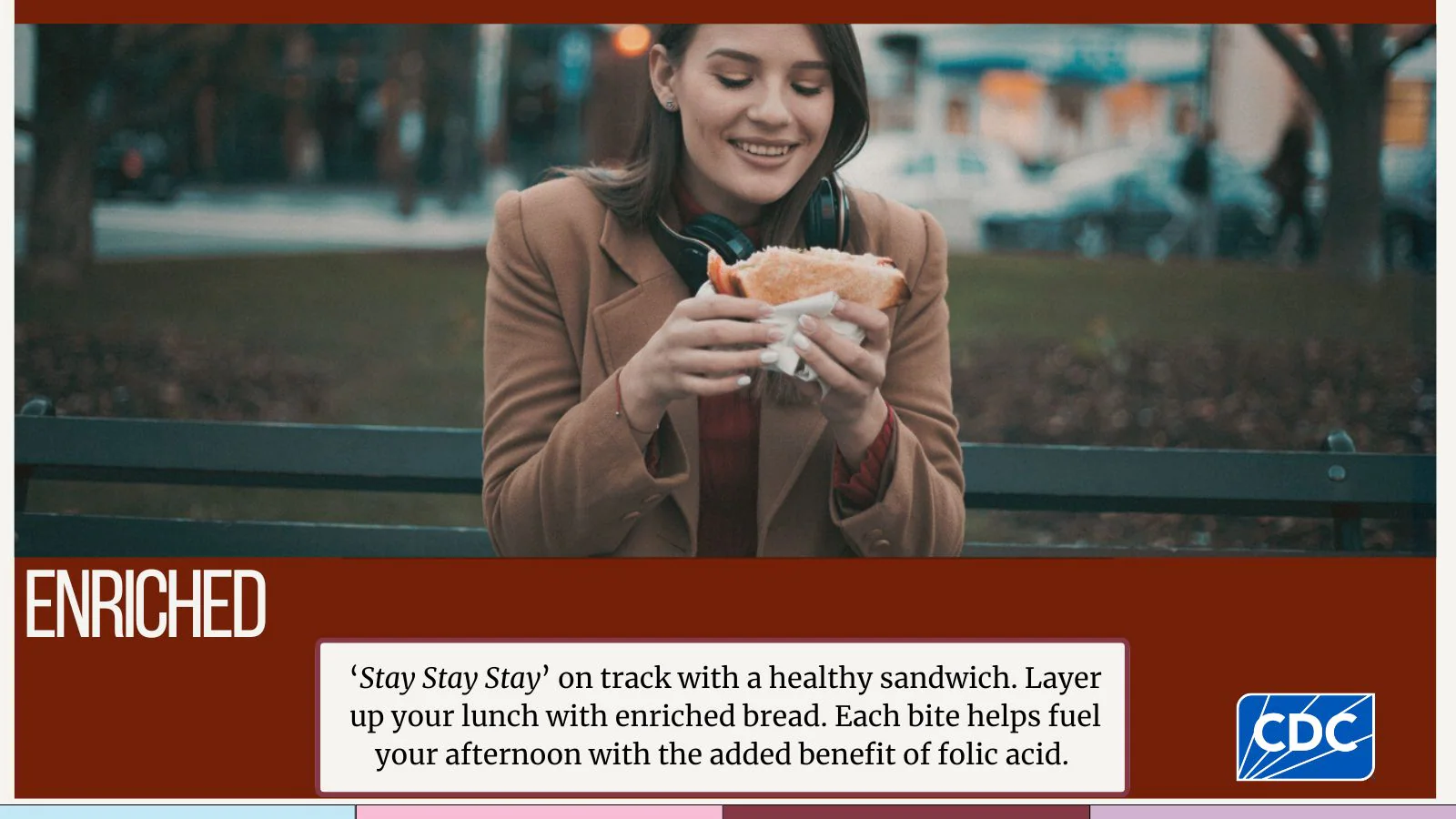 'Stay Stay Stay' on track- X Young adult sitting outside eating a sandwich.