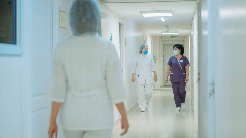 -- title missing -- people walking in the lab