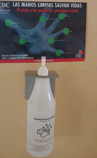 Hand Hygiene Educational Materials Hand hygiene educational materials with locally produced alcohol-based hand rub at a hospital in Moca, Dominican Republic.