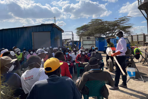 Public Health Partners in Kenya Public health partners in Kenya train sanitation workers who empty pit latrines on hygiene practice and personal protective equipment use.