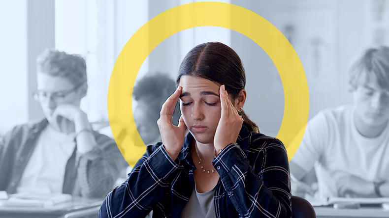 -- title missing -- Young women with hands on the sides of her head looking like she is in pain
