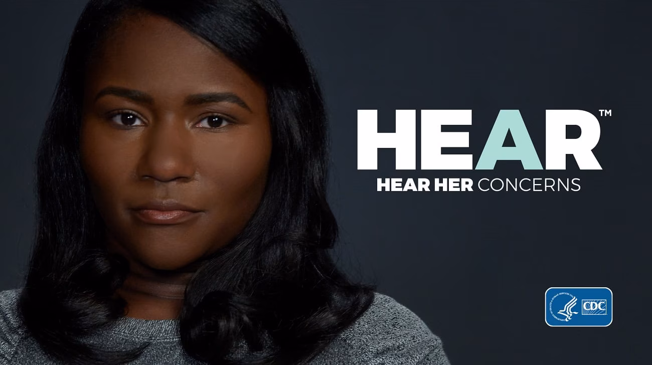 Hear Her Campaign Woman looking forward and the Hear Her logo