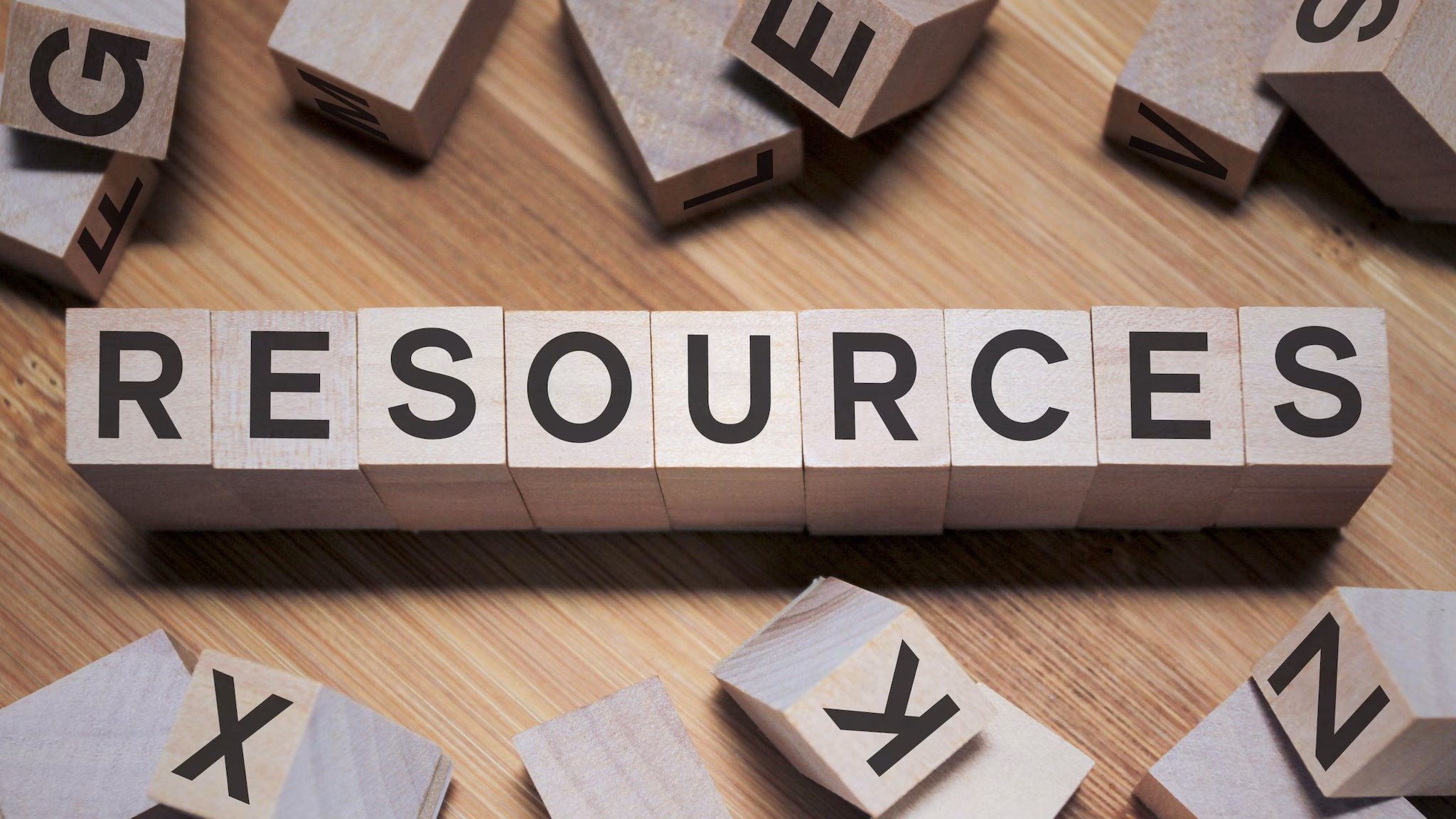 Resources Resources word in wooden cubes.