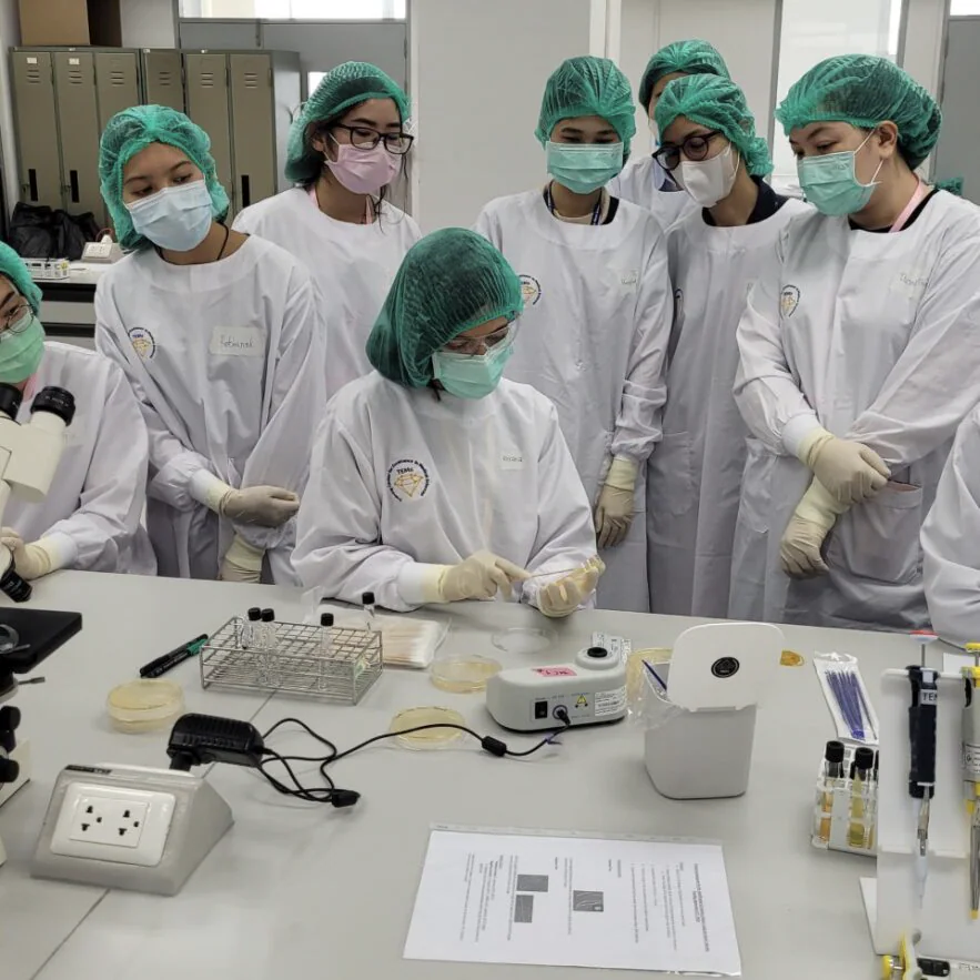 roxana-stewart-lab-thailand LLS fellow Roxana Rodriguez Stewart, PhD (seated), trains lab staff at training center in Thailand.