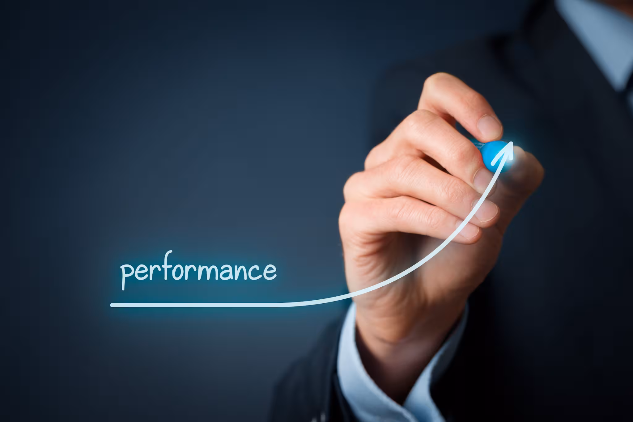 Decorative: Pen in hand writing "Performance"