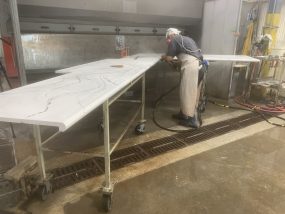 dust extractor for stone countertop grinding Dust extractor being used.