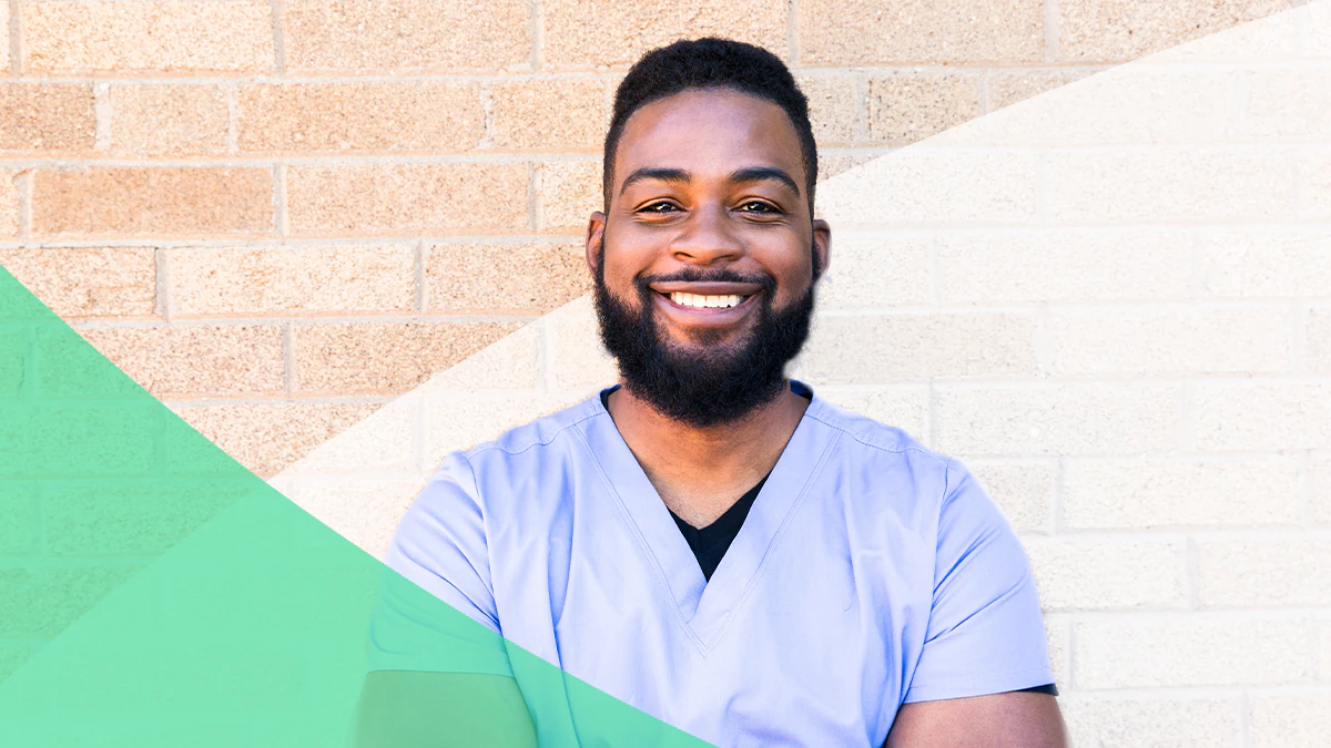 Prioritizing professional wellbeing 2 Portrait of smiling African American man in scrubs.