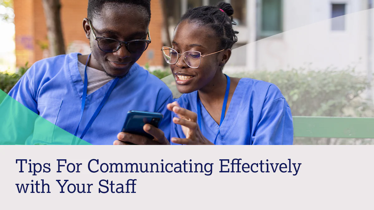 Tips for Communicating Effectively Hero Two healthcare workers look at a phone together with text "Tips for Communicating Effectively with Your Staff."