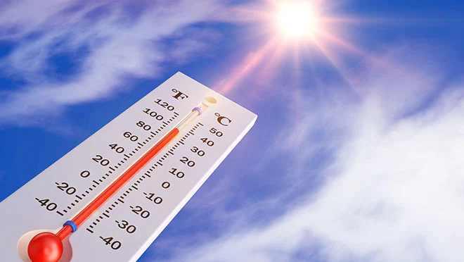 Acclimatization The thermometer on the background of the sun.