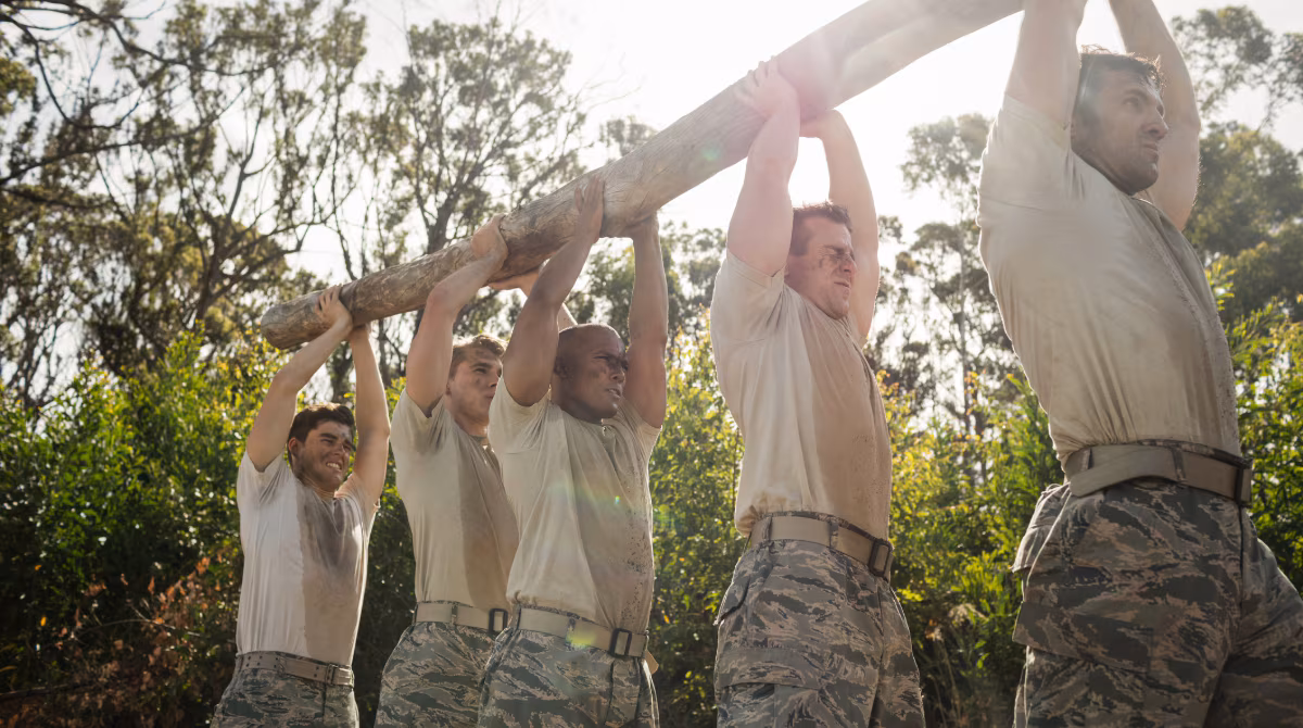 — title missing — Military personnel exercising outside, sweating