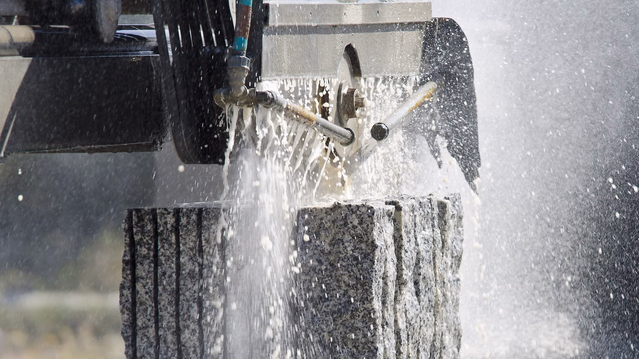 Water cutting stone method Water spraying method being used to cut a stone block.