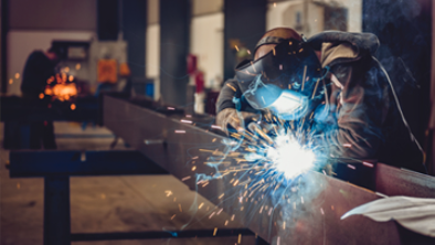 Welding thumbnail Industrial welder with a torch.