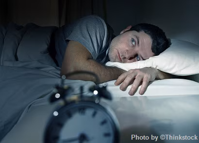 M3A Man waking up to alarm clcok in the morning