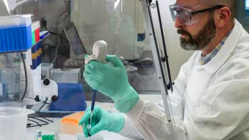 A CDC scientist implements molecular testing to test for different types of polio. CDC PHIL photo: James Gathany. A CDC scientist implements molecular testing to test for different types of polio. CDC PHIL photo: James Gathany.