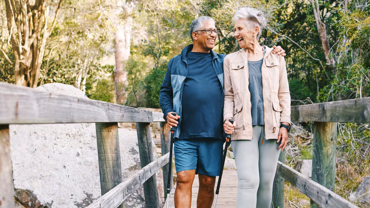 — title missing — Older couple walking outdoors