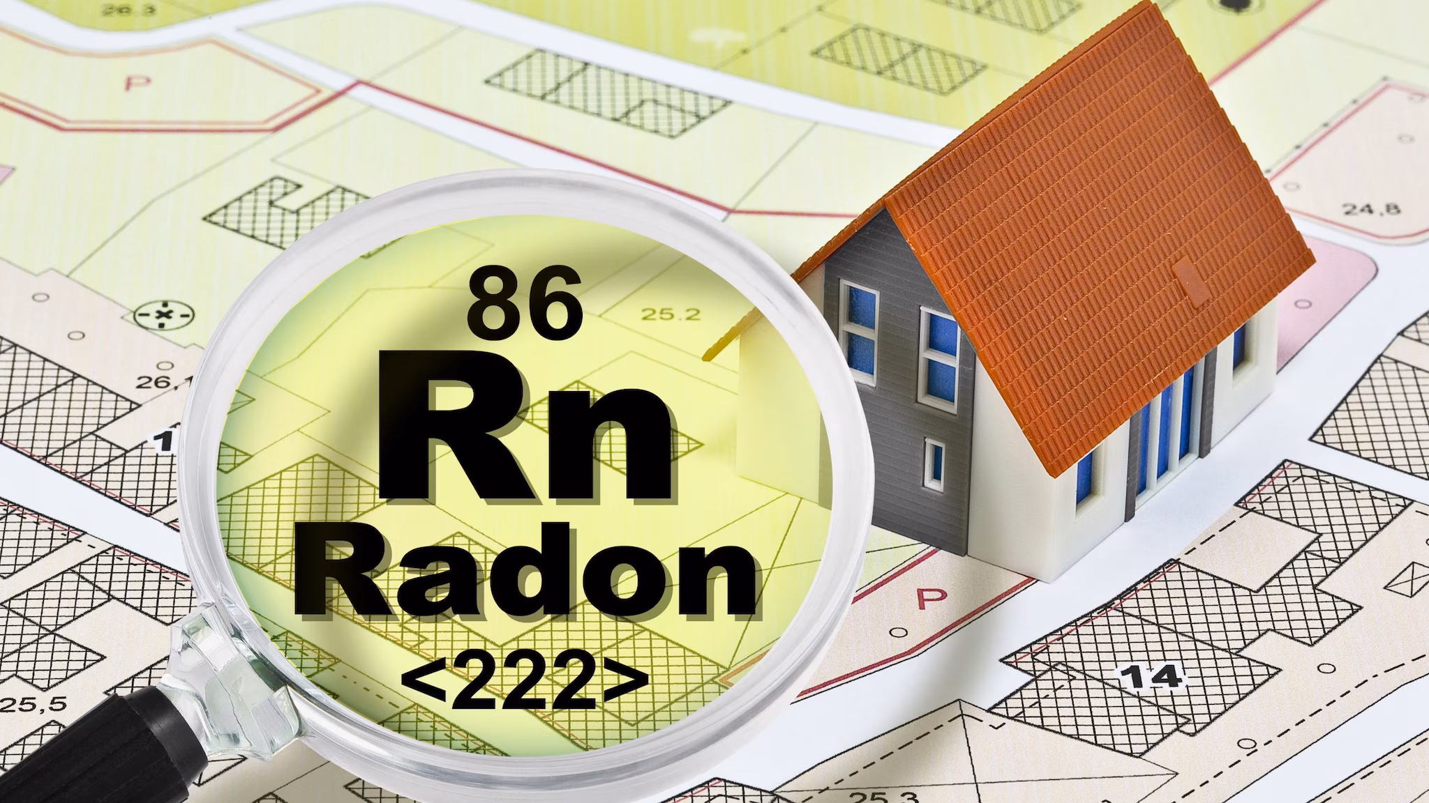 A gamepiece house sits on top of a neighborhood map. A magnifying glass hovers over the map with text in the lens that reads, "86 Rn Radon "
