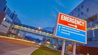 Healthcare Facility Response Activities Hospital sign showing directions to emergency room