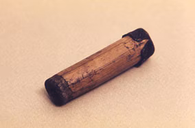 Variolation A small brown, cylindrical container