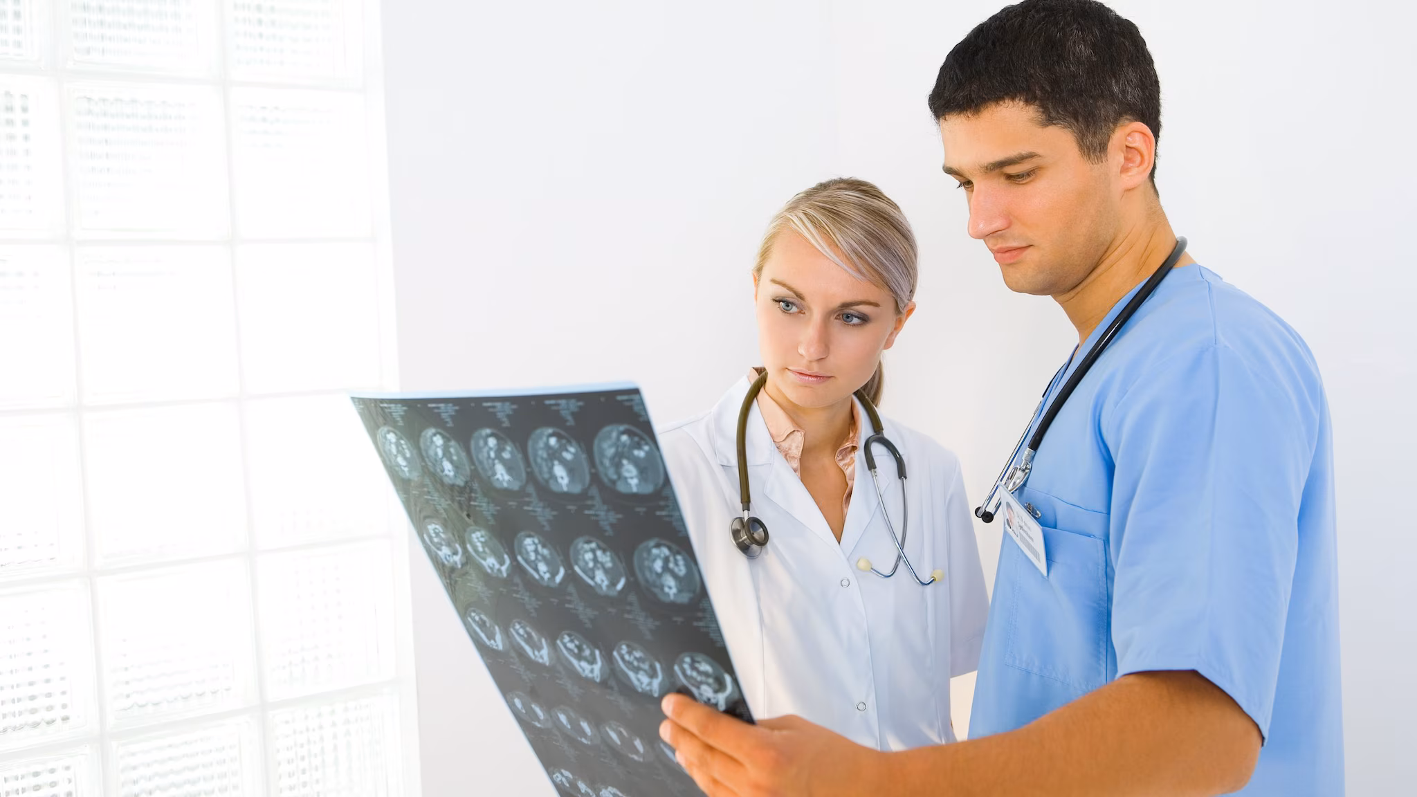 Brain scan Doctors looking at the results of a brain scan