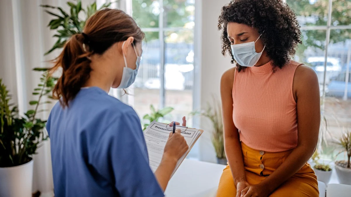 Doctor Patient a woman talking to her doctor