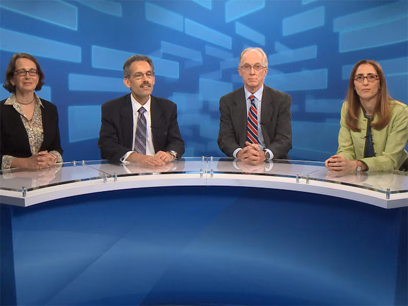 Dr. Reibman, Dr. Prezant, Dr. Crane, and Dr. Nomi Levy-Carrick sitting around a semi-circular desk preparing to discuss Airway, Digestive and Mental Health Conditions in WTC Responders and Survivors