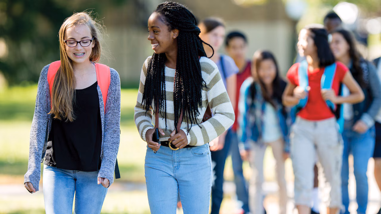 MMWR Supplementary High school students walking to school.